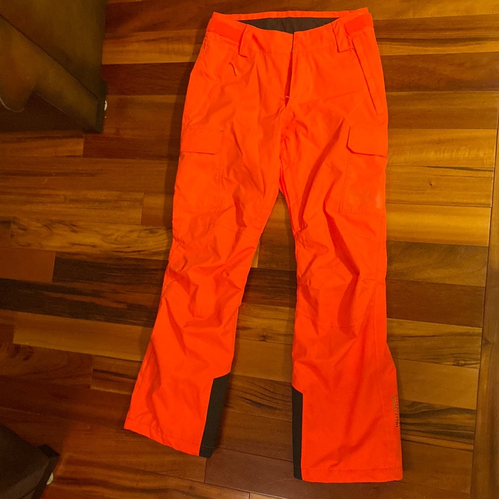 Womens Helly Hansen ski/ snow pants lightly worn in bright orange.